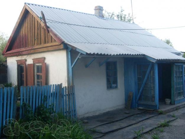 Дом с флигелем и земельным участком